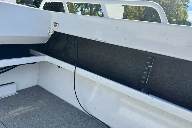 Slide: The Image of Interior view of a 2006 North River 21 Seahawk boat, showcasing storage compartment. - 19