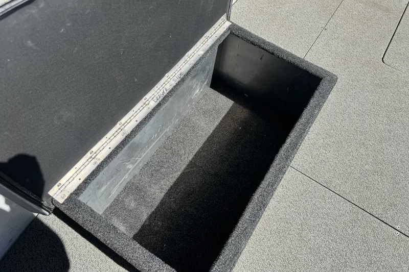 Slide: The Image of Open storage compartment on a 2006 North River 21 Seahawk boat. - 15