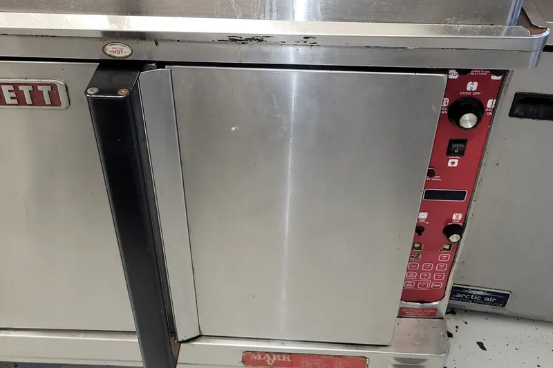 Slide: The Image of Stainless steel commercial oven with control panel, Custom model, 1985. - 5