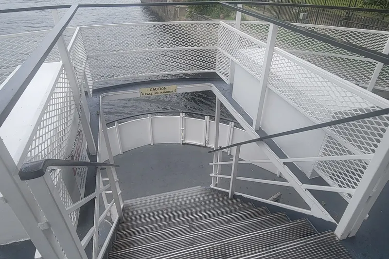 Slide: The Image of Staircase on 1985 custom dinner excursion passenger boat with safety railings. - 14