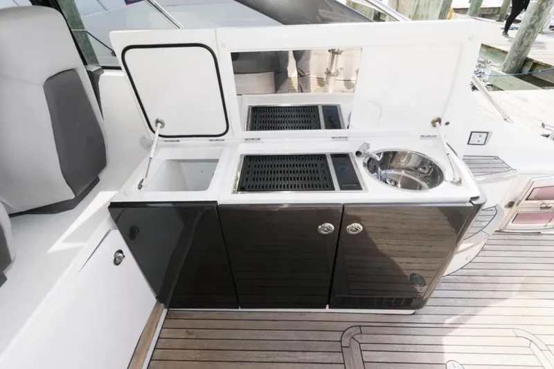 Slide: The Image of Outdoor kitchenette on 2016 Princess V39 yacht with sink and grill. - 31