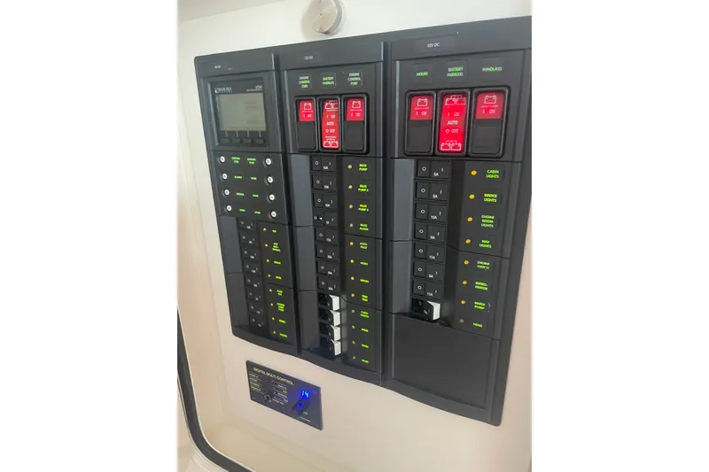 Slide: The Image of Electrical control panel on a 2014 Hinckley Talaria 34 boat. - 20