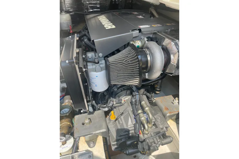 Slide: The Image of Engine compartment of a 2014 Hinckley Talaria 34, featuring a Yanmar engine. - 22
