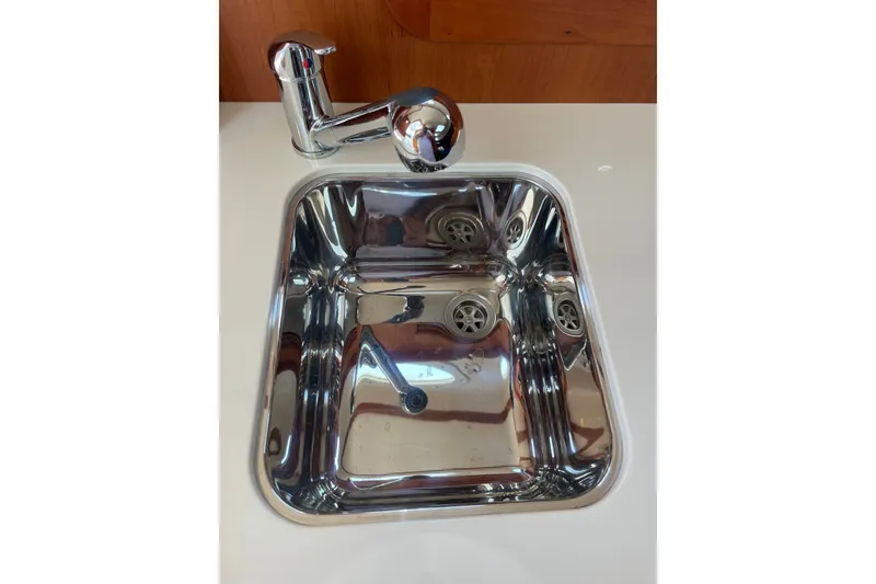 Slide: The Image of Stainless steel sink and faucet on 2014 Hinckley Talaria 34 yacht. - 16
