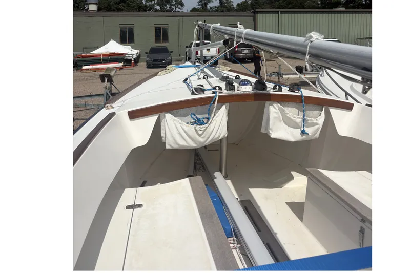 Slide: The Image of 2019 Alerion Express 20 sailboat cockpit with rigging and storage bags. - 14