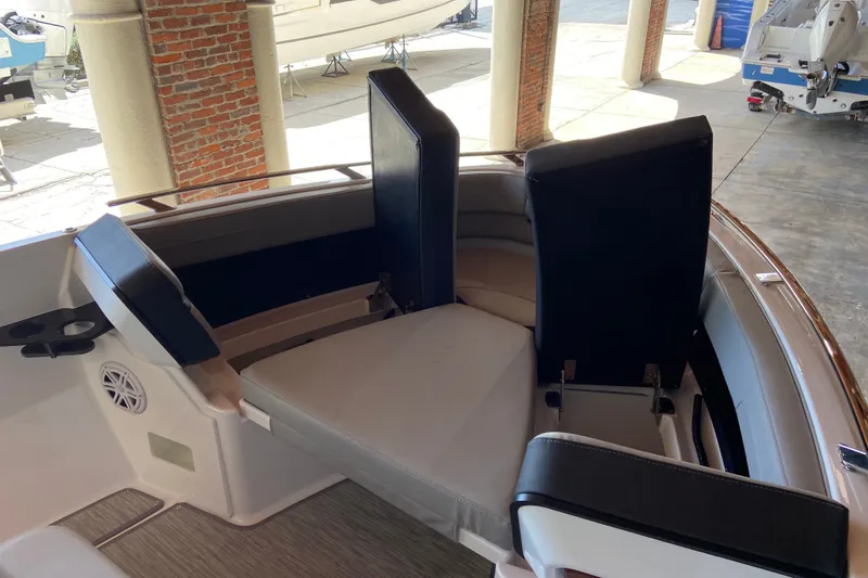 Slide: The Image of Interior seating of 2027 Monterey Elite 27 OB boat, featuring modern design and comfort. - 19