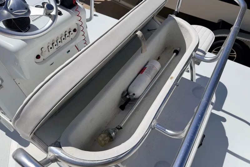 Slide: The Image of Boat console storage with fire extinguisher, NewWater Ibis 2011 model. - 22