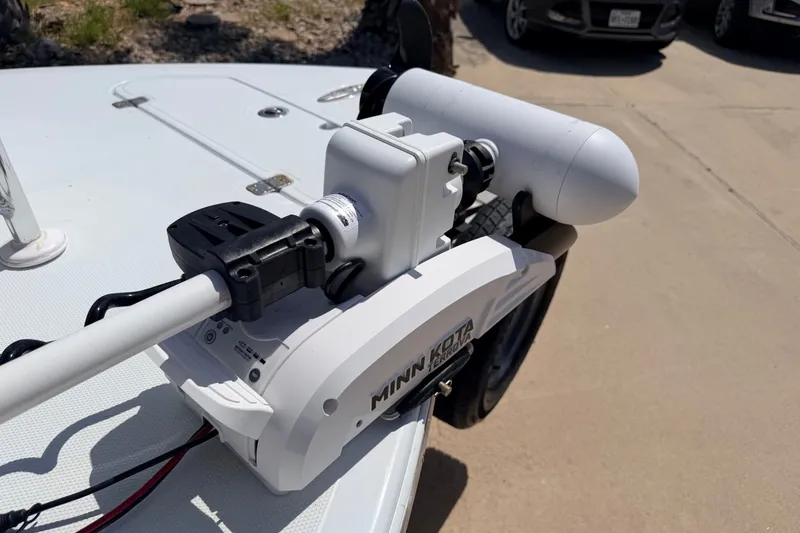 Slide: The Image of Minn Kota trolling motor mounted on a NewWater Ibis 2011 boat deck. - 30