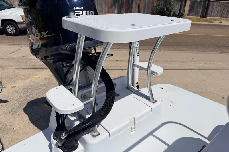 Slide: The Image of Boat with Yamaha engine and NewWater Ibis model, 2011, featuring a sturdy platform. - 26