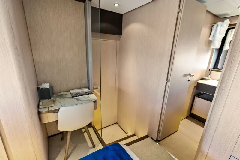 Slide: The Image of Luxurious interior of 2024 Ferretti Yachts 860, featuring elegant wood finishes and modern design. - 98
