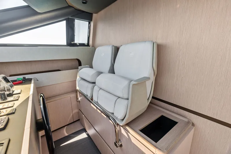 Slide: The Image of Luxurious helm seating in 2024 Ferretti Yachts 860, featuring modern design and premium materials. - 66