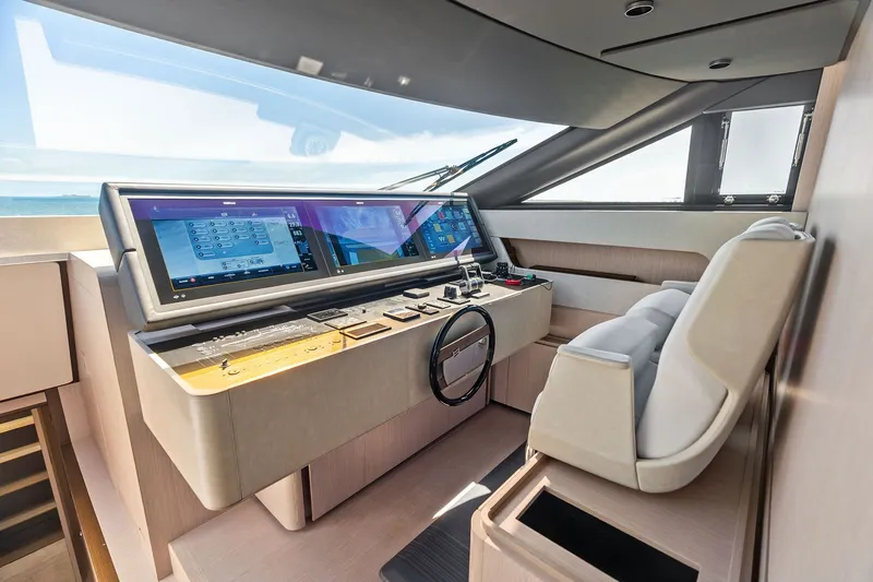 Slide: The Image of Luxurious helm station of 2024 Ferretti Yachts 860 with advanced navigation systems. - 67