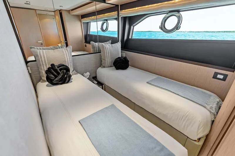 Slide: The Image of Luxurious twin cabin interior of 2024 Ferretti Yachts 860 with ocean view. - 91