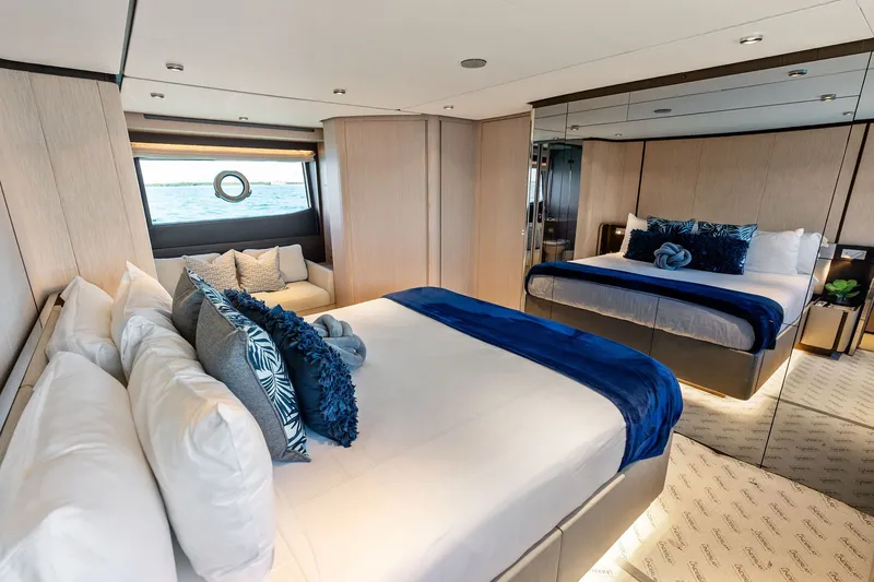 Slide: The Image of Luxurious bedroom interior of 2024 Ferretti Yachts 860 with elegant decor and ocean view. - 76