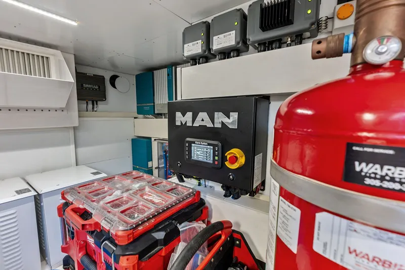Slide: The Image of Engine room of 2024 Ferretti Yachts 860 with MAN control panel and equipment. - 112