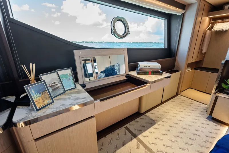 Slide: The Image of Luxurious interior of 2024 Ferretti Yachts 860 with elegant decor and sea view. - 77