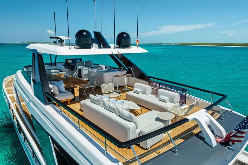 Slide: The Image of Luxurious 2024 Ferretti Yachts 860 on turquoise waters, featuring elegant outdoor seating. - 21