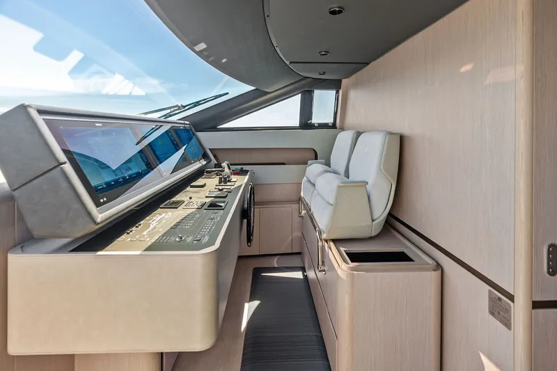 Slide: The Image of 2024 Ferretti Yachts 860 helm station with modern controls and panoramic windows. - 68