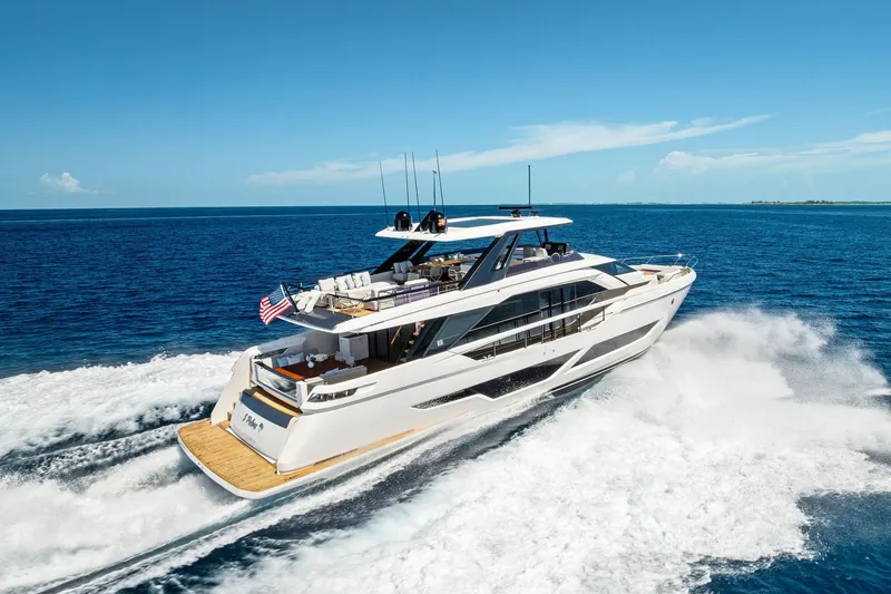 Slide: The Image of 2024 Ferretti Yachts 860 cruising on open sea under clear blue sky. - 17