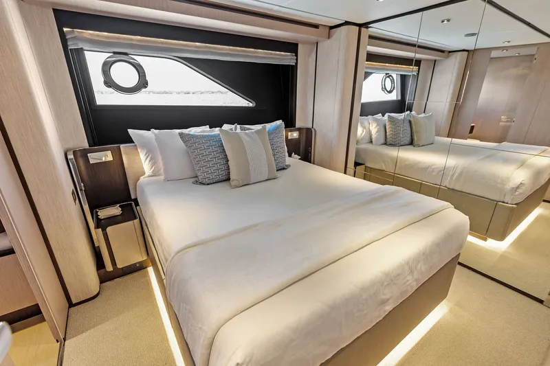 Slide: The Image of Luxurious bedroom interior of 2024 Ferretti Yachts 860 with modern design and elegant furnishings. - 86