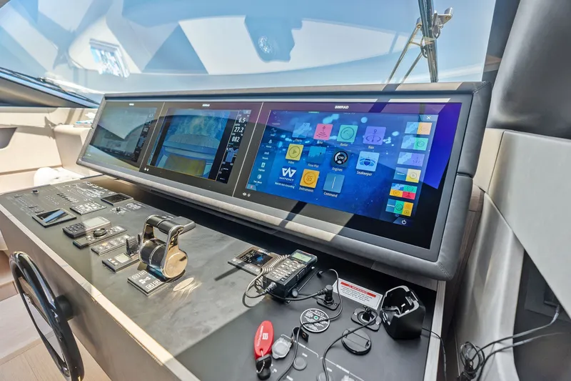 Slide: The Image of Control panel of 2024 Ferretti Yachts 860 with advanced navigation displays. - 70