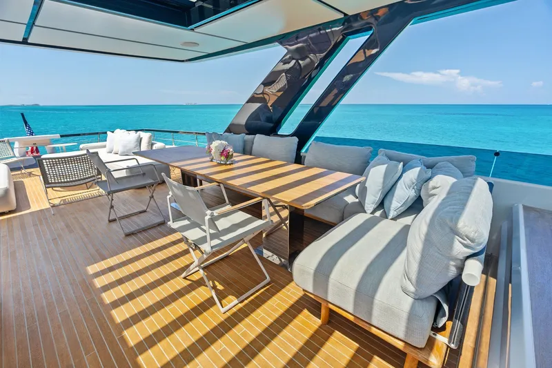 Slide: The Image of Luxurious deck of 2024 Ferretti Yachts 860 with ocean view and elegant seating. - 44
