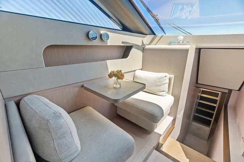 Slide: The Image of Luxurious interior of 2024 Ferretti Yachts 860, featuring elegant seating and modern design. - 64