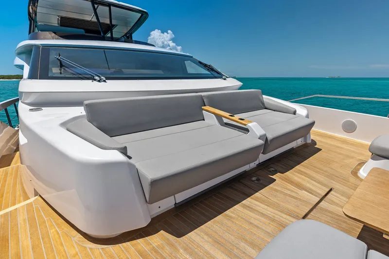 Slide: The Image of Luxurious 2024 Ferretti Yachts 860 deck with elegant seating and ocean view. - 31