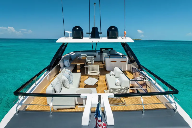 Slide: The Image of Luxurious 2024 Ferretti Yachts 860 on turquoise waters, featuring elegant outdoor seating. - 22