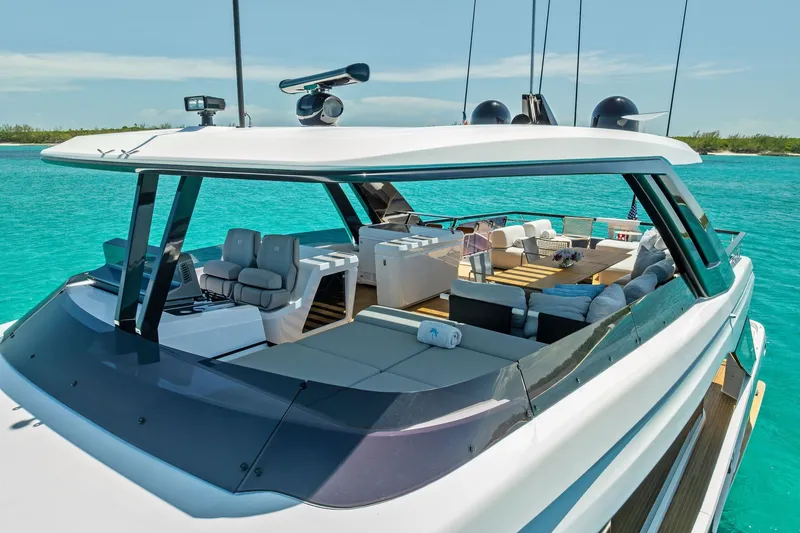 Slide: The Image of Luxurious 2024 Ferretti Yachts 860 on turquoise waters, featuring spacious deck and modern design. - 23