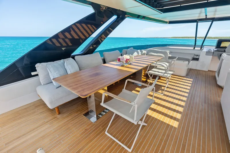 Slide: The Image of Luxurious deck of 2024 Ferretti Yachts 860 with elegant seating and ocean view. - 45