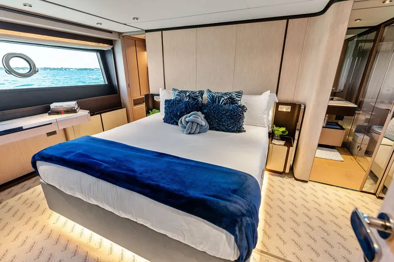 Slide: The Image of Luxurious bedroom interior of 2024 Ferretti Yachts 860 with ocean view and elegant decor. - 74