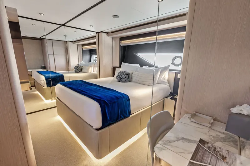 Slide: The Image of Luxurious bedroom interior of 2024 Ferretti Yachts 860 with modern design and elegant furnishings. - 97