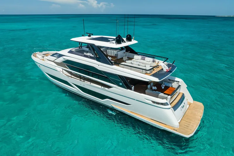 Slide: The Image of Luxurious 2024 Ferretti Yachts 860 cruising on clear turquoise waters. - 4