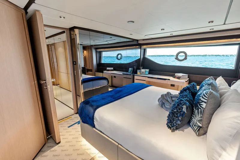 Slide: The Image of Luxurious bedroom interior of 2024 Ferretti Yachts 860 with ocean view. - 75