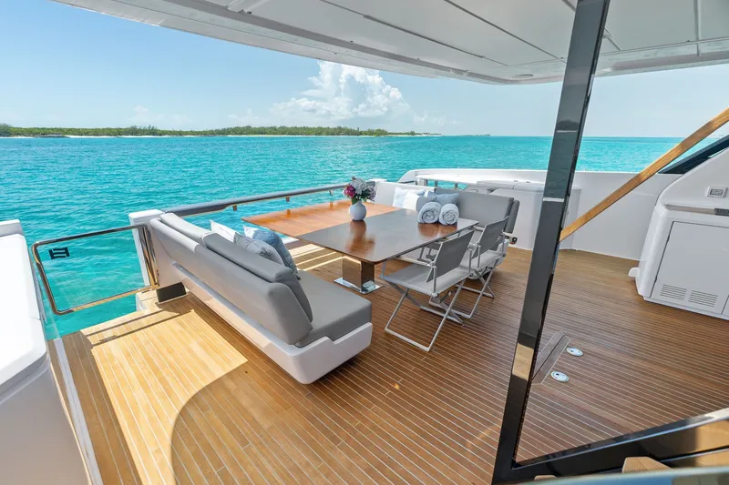 Slide: The Image of Luxurious deck of 2024 Ferretti Yachts 860 with elegant seating and ocean view. - 52