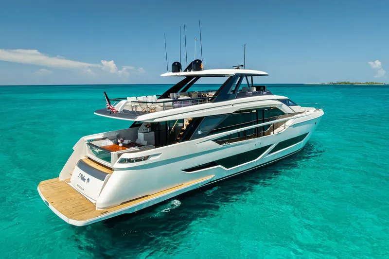 Slide: The Image of Luxurious 2024 Ferretti Yachts 860 cruising in clear turquoise waters. - 9
