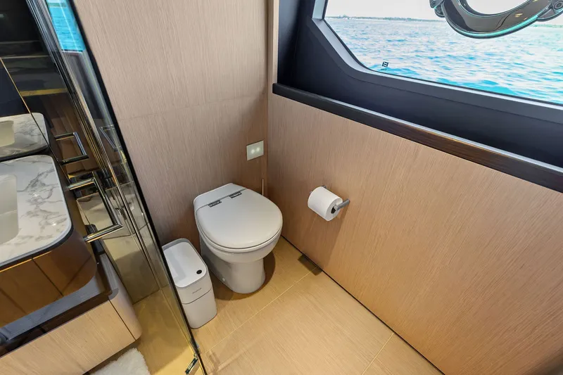 Slide: The Image of Luxurious bathroom on 2024 Ferretti Yachts 860 with ocean view window. - 84