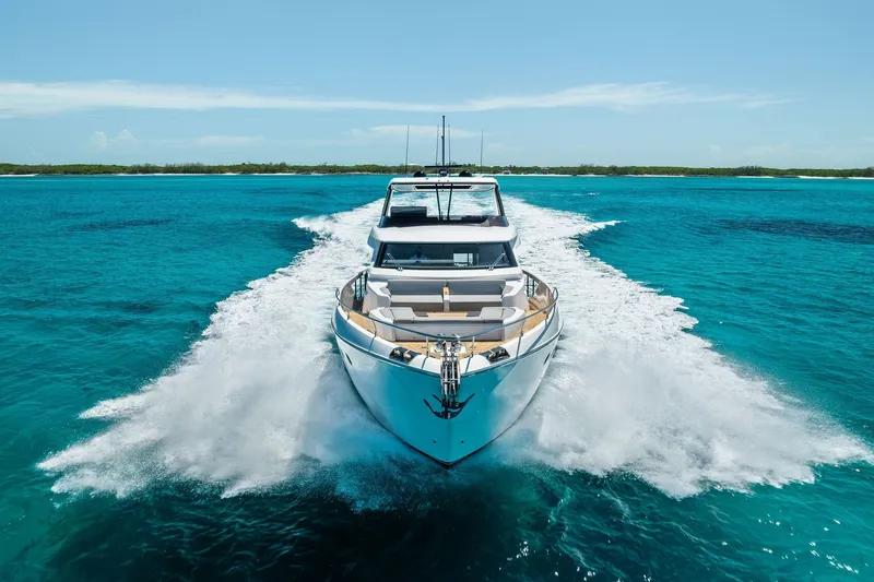 Slide: The Image of 2024 Ferretti Yachts 860 cruising on clear blue waters. - 10