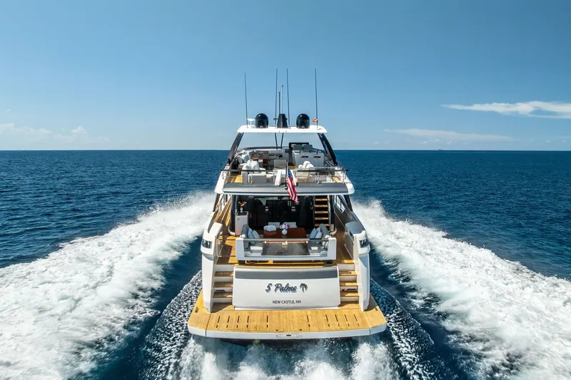 Slide: The Image of 2024 Ferretti Yachts 860 cruising on open sea, rear view. - 14