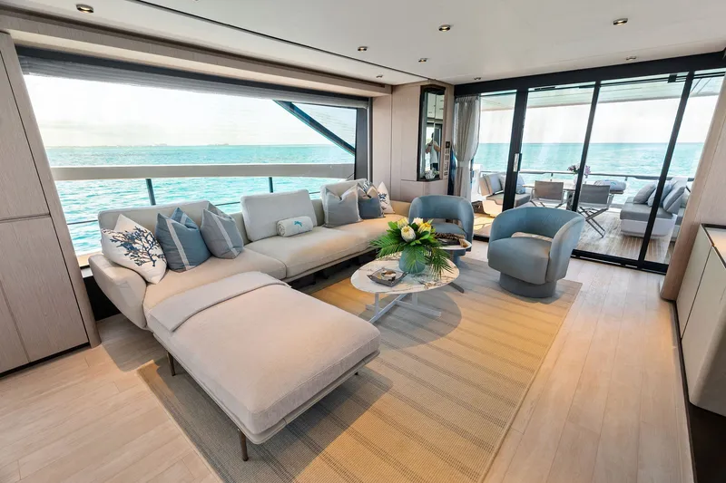 Slide: The Image of Luxurious interior of 2024 Ferretti Yachts 860 with ocean view and elegant seating. - 56