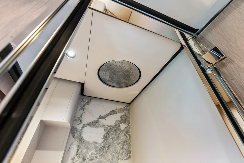Slide: The Image of Luxurious bathroom interior of 2024 Ferretti Yachts 860 with marble flooring and modern fixtures. - 103
