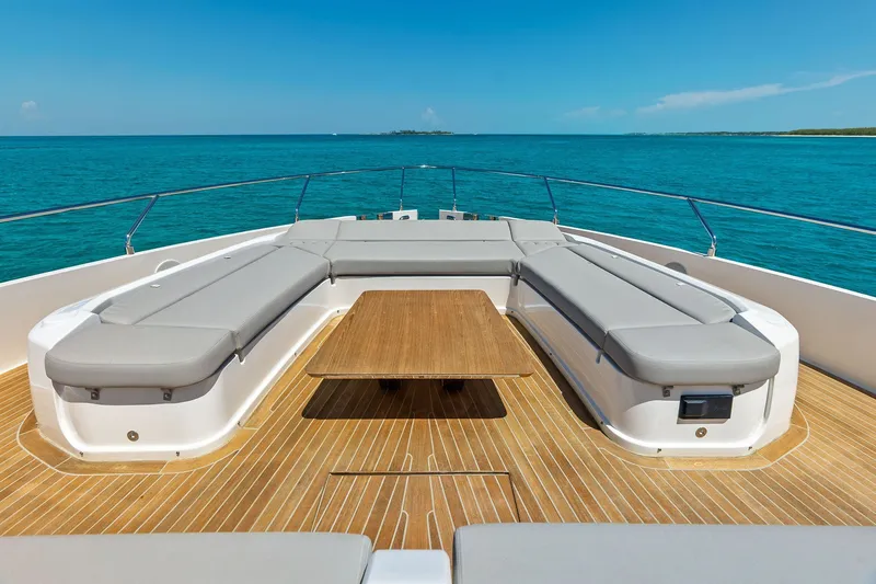 Slide: The Image of Luxurious 2024 Ferretti Yachts 860 deck with elegant seating and ocean view. - 32