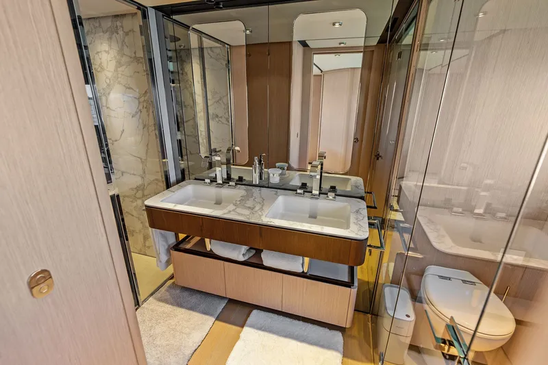 Slide: The Image of Luxurious bathroom in 2024 Ferretti Yachts 860, featuring dual sinks and elegant marble accents. - 80