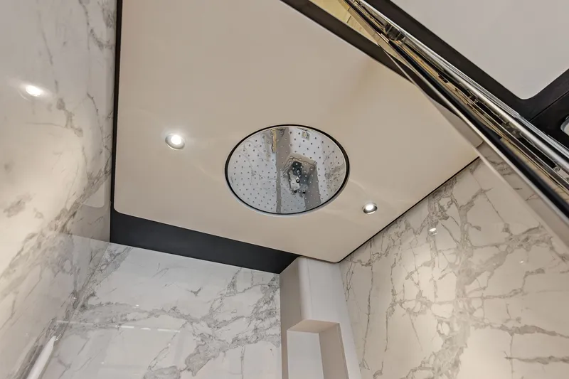 Slide: The Image of Luxurious marble shower with modern fixtures in 2024 Ferretti Yachts 860. - 83
