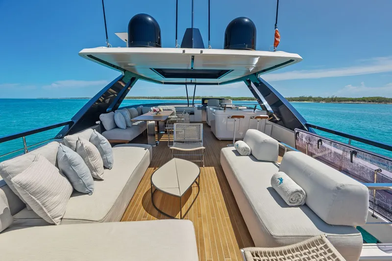 Slide: The Image of Luxurious 2024 Ferretti Yachts 860 deck with elegant seating and ocean view. - 39