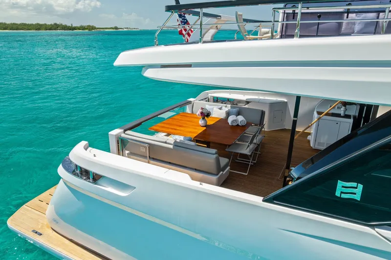 Slide: The Image of Luxurious 2024 Ferretti Yachts 860 with elegant deck and turquoise sea backdrop. - 20