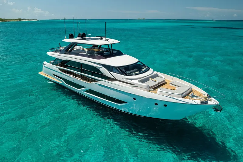 Slide: The Image of 2024 Ferretti Yachts 860 cruising on clear turquoise waters. - 1