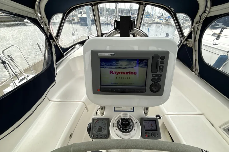 Slide: The Image of Cockpit of 2010 Hunter 36 sailboat with Raymarine navigation system. - 26
