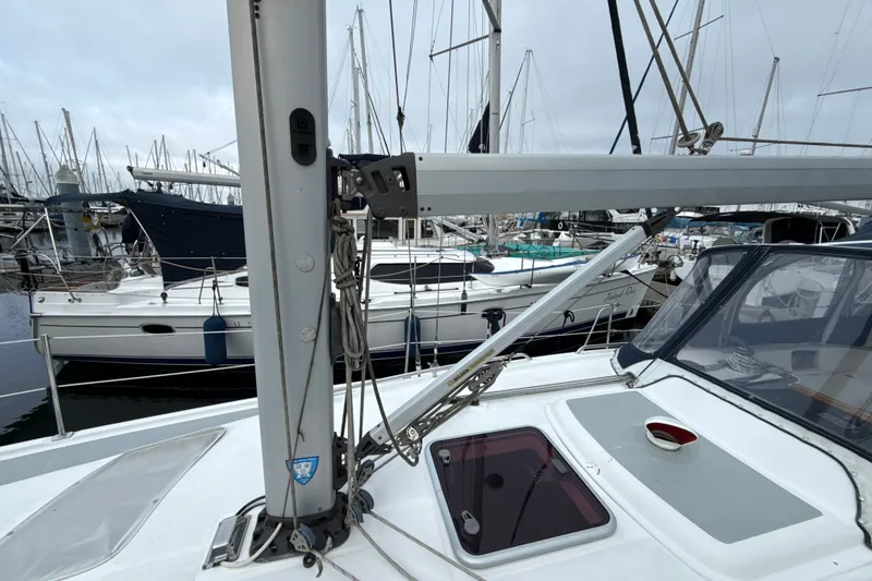 Slide: The Image of Sailboat deck view of a 2010 Hunter 36 in a marina. - 35